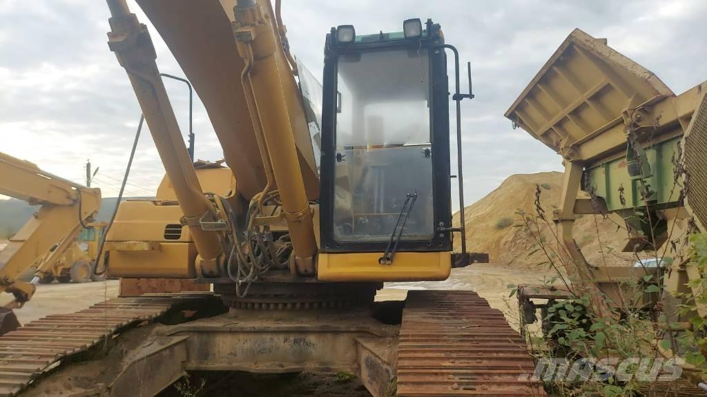 CAT 345 B L Бони і ковші