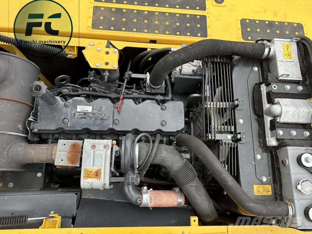 Komatsu 240 Гусеничні екскаватори