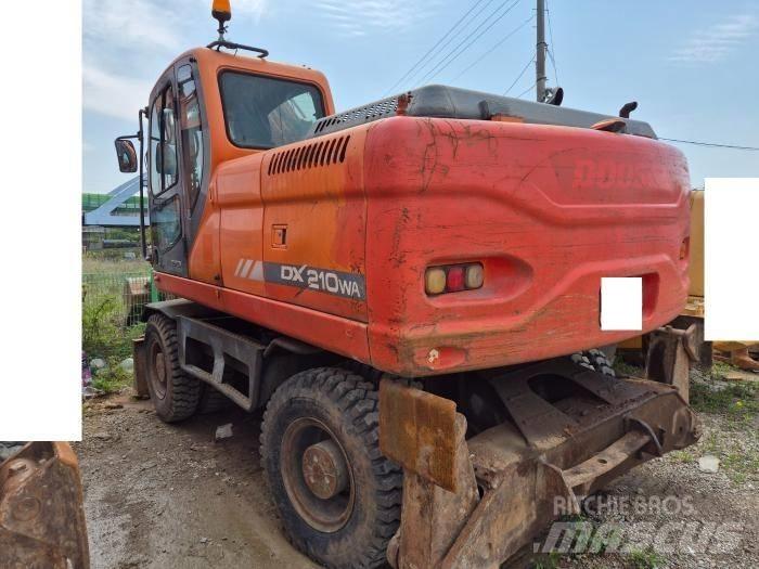 Doosan DX210WA Колісні екскаватори