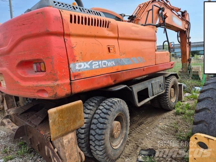 Doosan DX210WA Колісні екскаватори