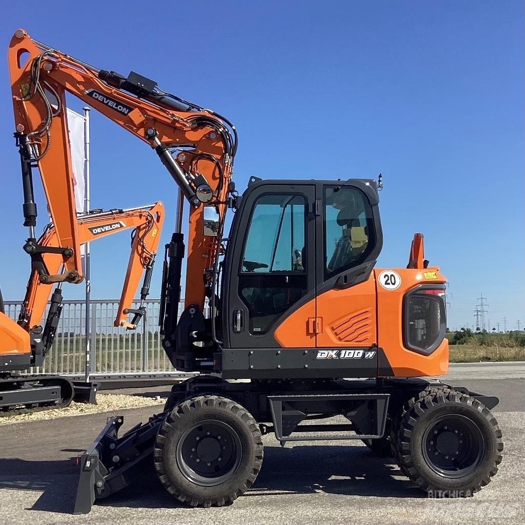 Develon DX100W-7 Колісні екскаватори