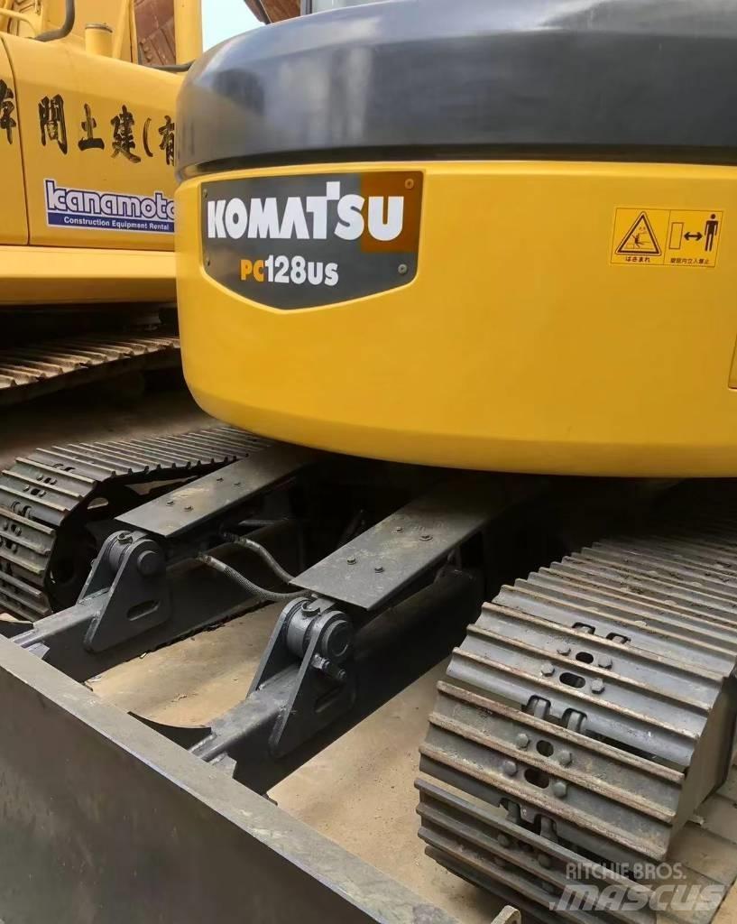 Komatsu 128 US Гусеничні екскаватори