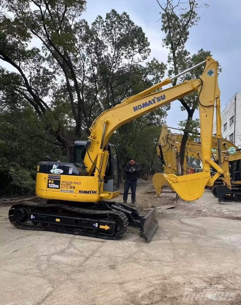 Komatsu 128 US Гусеничні екскаватори
