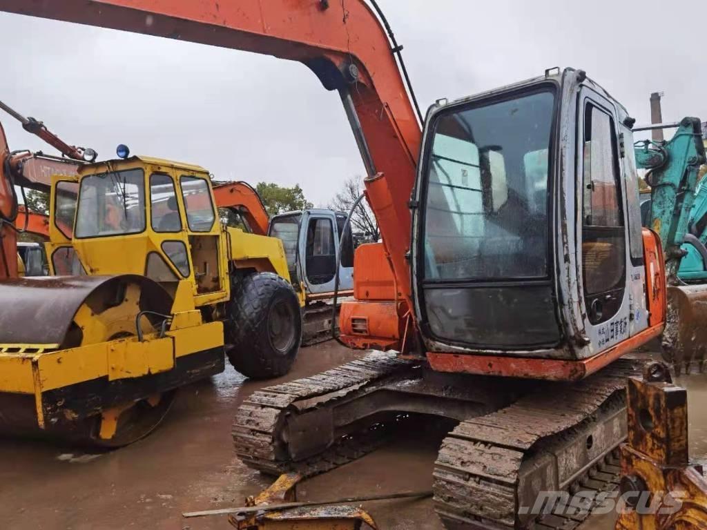 Hitachi EX 60 Міні-екскаватори < 7т