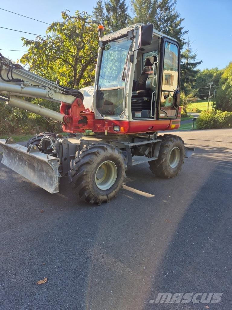 Takeuchi TB 295 W Колісні екскаватори