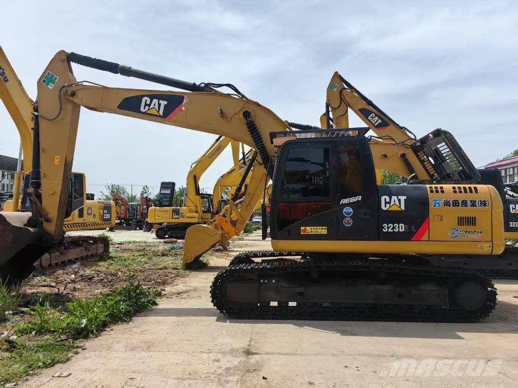CAT 323 D Гусеничні екскаватори