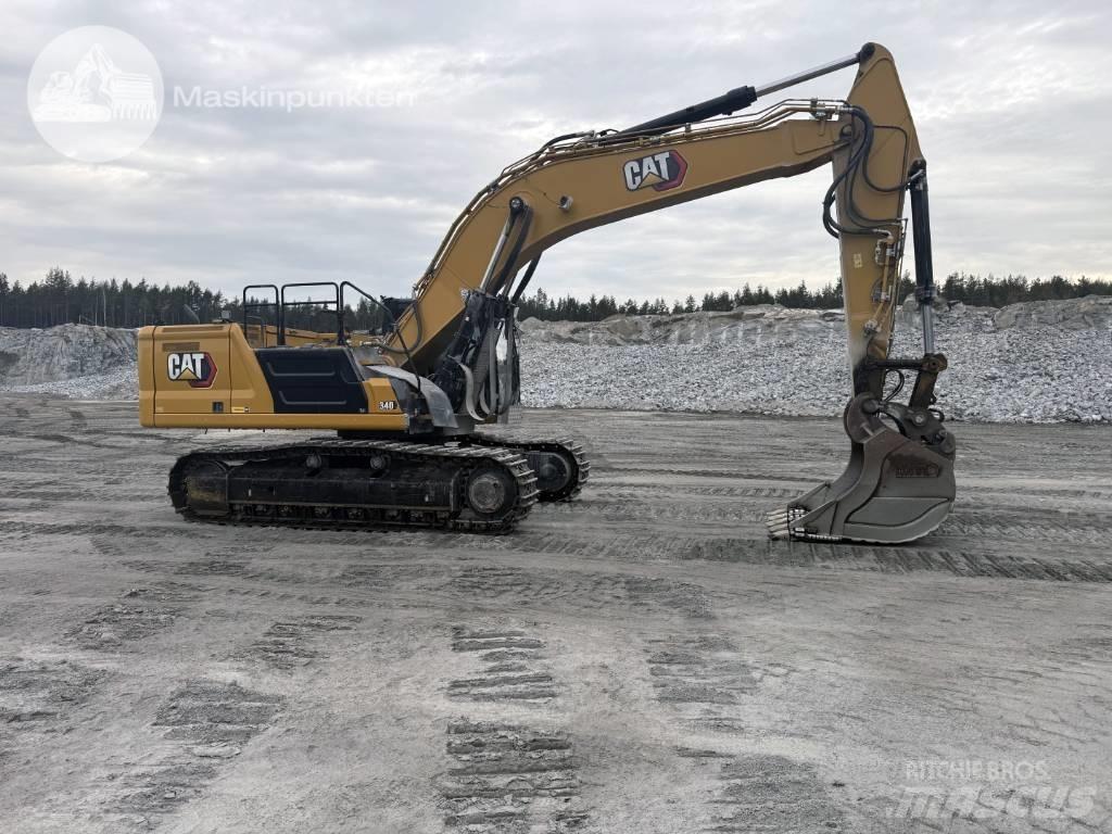 CAT 340 Гусеничні екскаватори