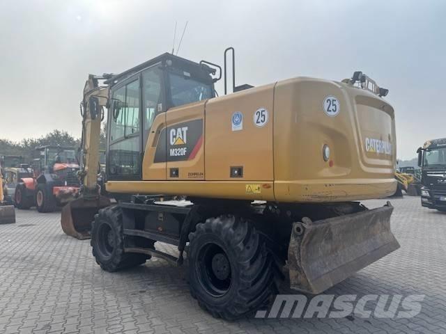 CAT M 320 F Колісні екскаватори