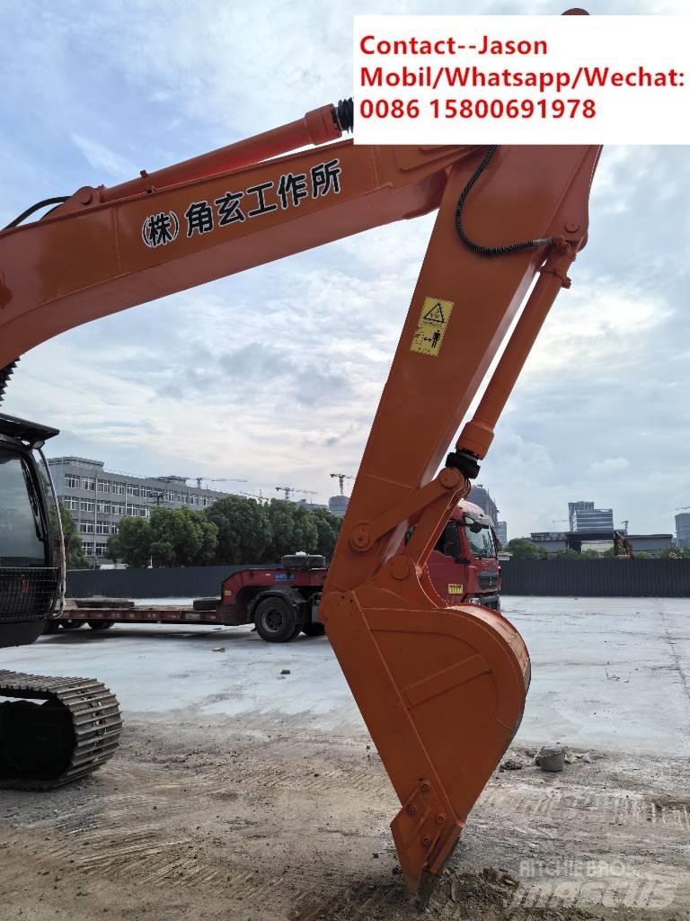 Hitachi ZX 200 Гусеничні екскаватори