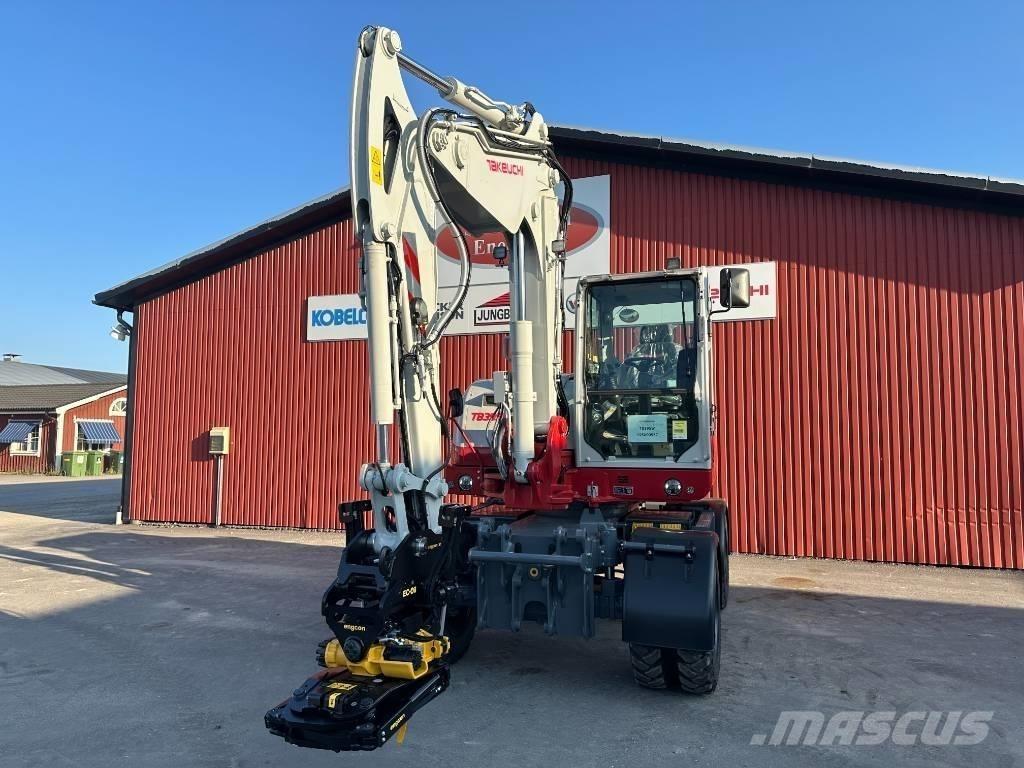 Takeuchi TB 395 W Колісні екскаватори