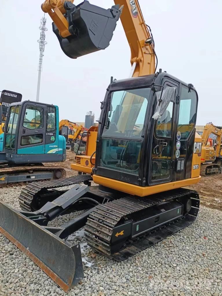 CAT 307 Гусеничні екскаватори
