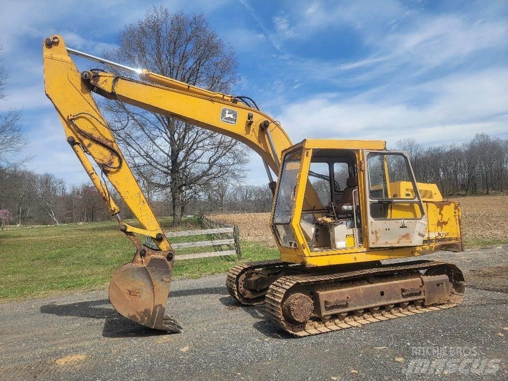 John Deere 490 Гусеничні екскаватори