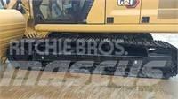 CAT 2022 CAT 323GC Колісні екскаватори