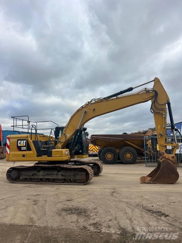 CAT 320 Гусеничні екскаватори