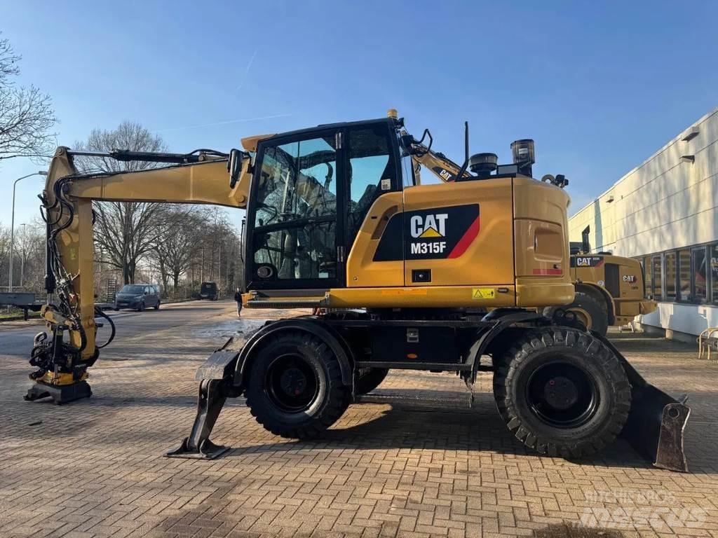 CAT M315F Колісні екскаватори