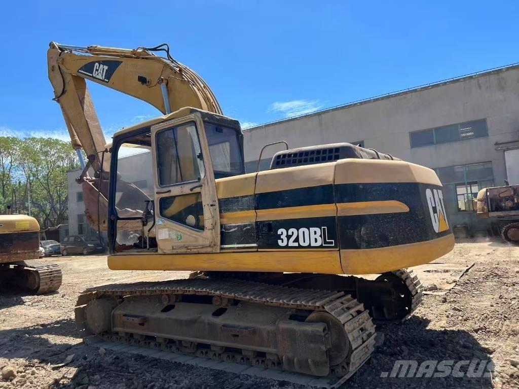 CAT 320 B L Гусеничні екскаватори