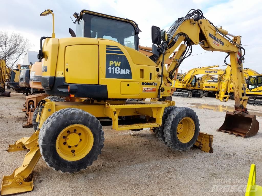 Komatsu PW118MR-8 Колісні екскаватори