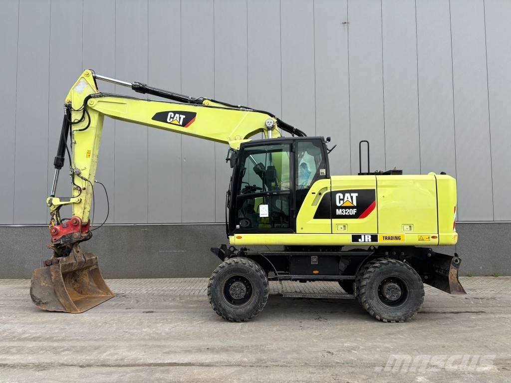 CAT M 320 F Колісні екскаватори