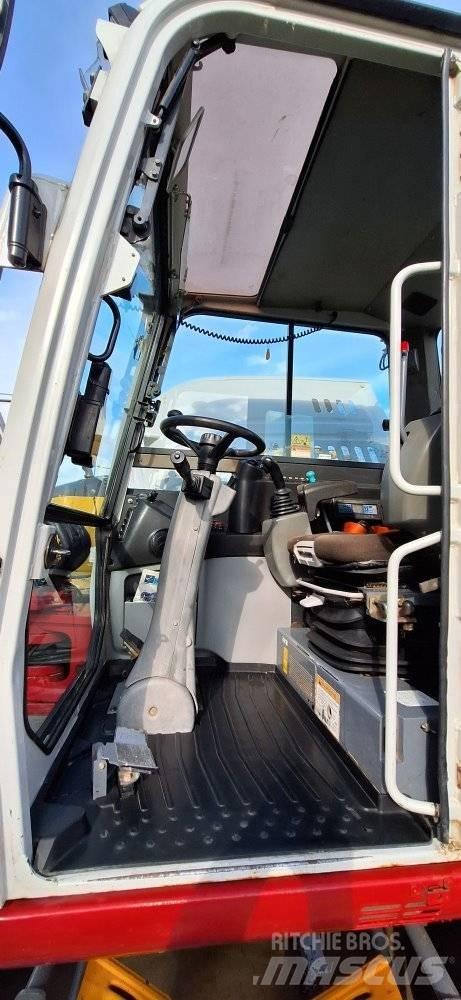 Takeuchi TB 295W Колісні екскаватори
