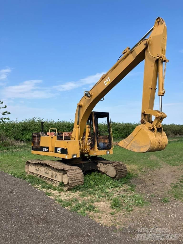 CAT 211 B LC Гусеничні екскаватори