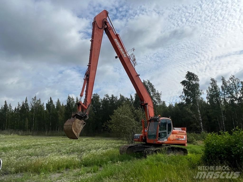 Doosan DX 225 LC Екскаватори з великим вилітом