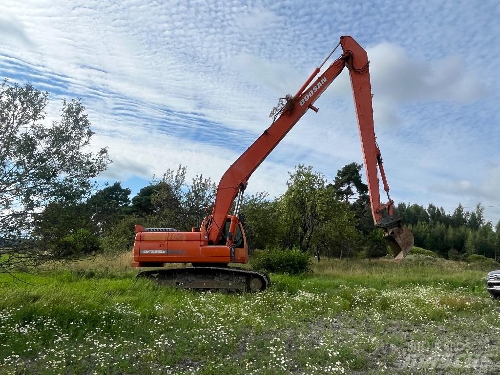 Doosan DX 225 LC Екскаватори з великим вилітом