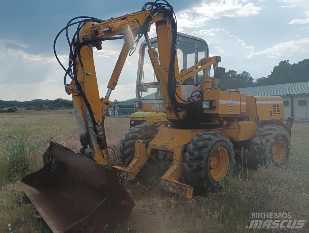 Mecalac 11 CX Колісні екскаватори