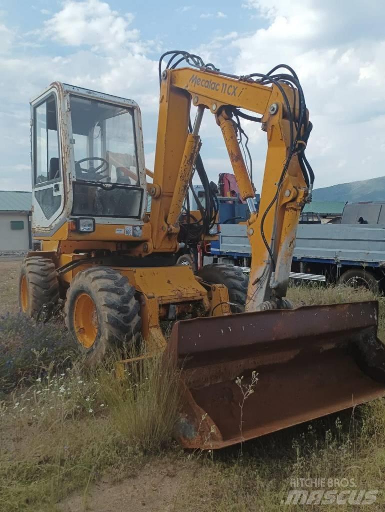 Mecalac 11 CX Колісні екскаватори
