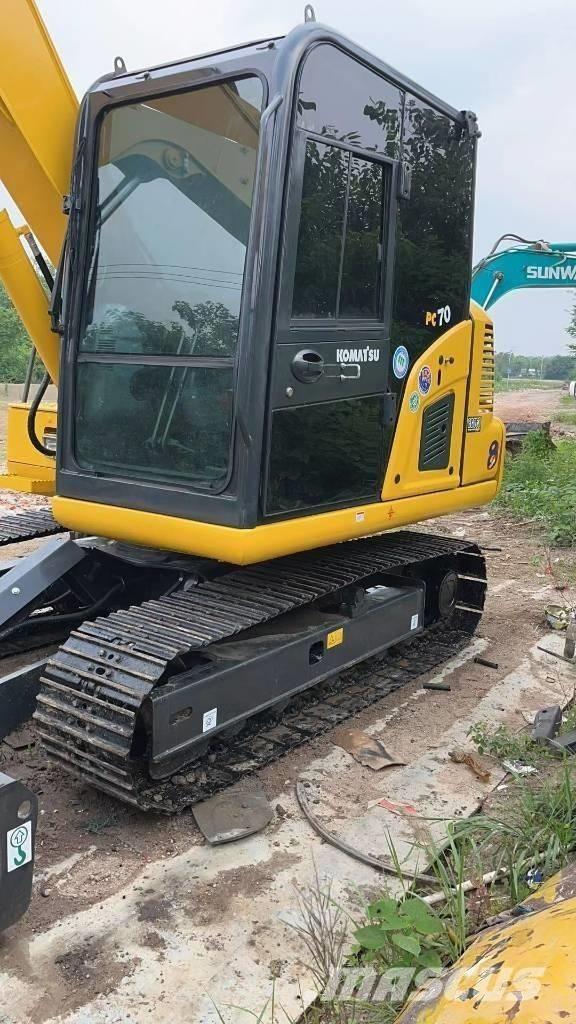 Komatsu 70 Гусеничні екскаватори