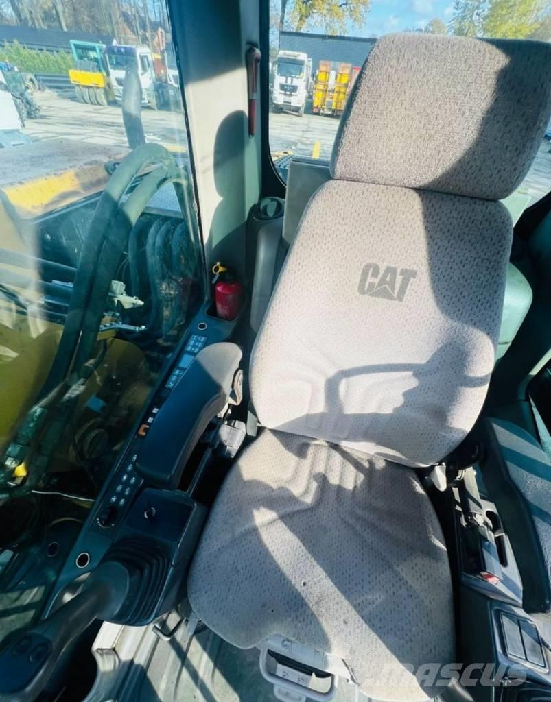 CAT M313D Колісні екскаватори