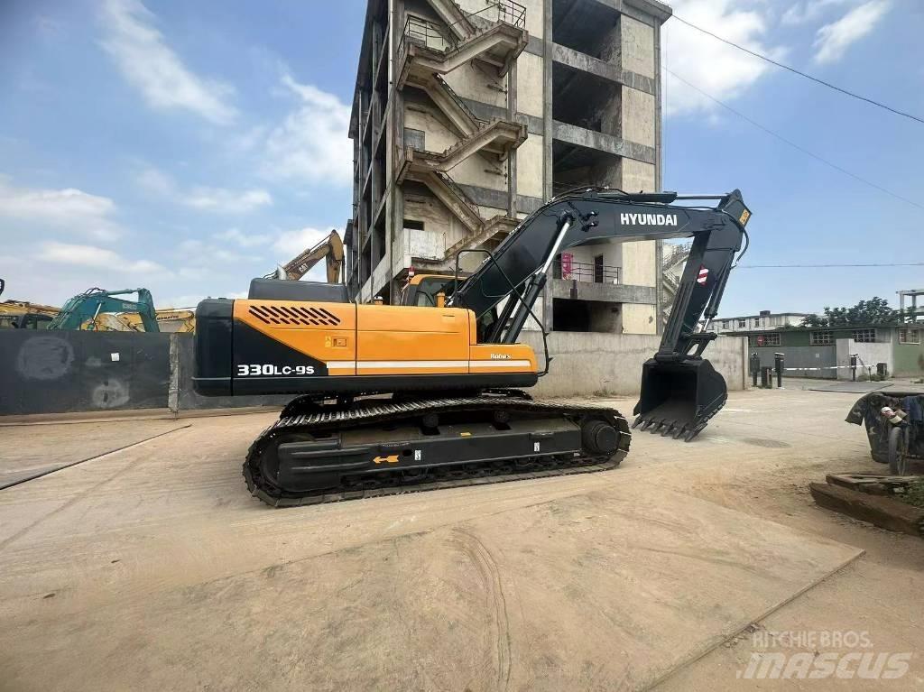 Hyundai 330-9s Гусеничні екскаватори