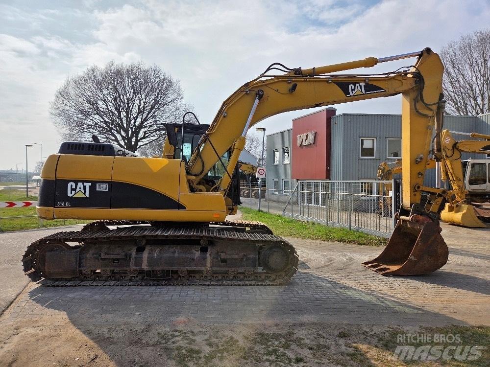 CAT 318CL Гусеничні екскаватори