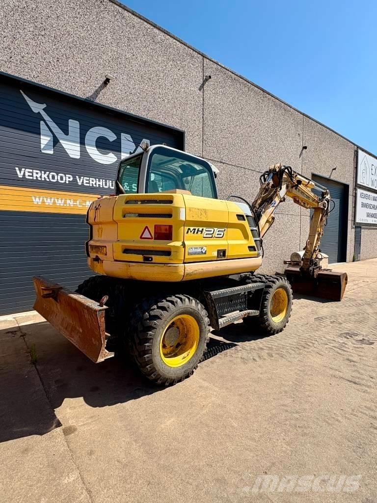 New Holland MH 2.6 Колісні екскаватори