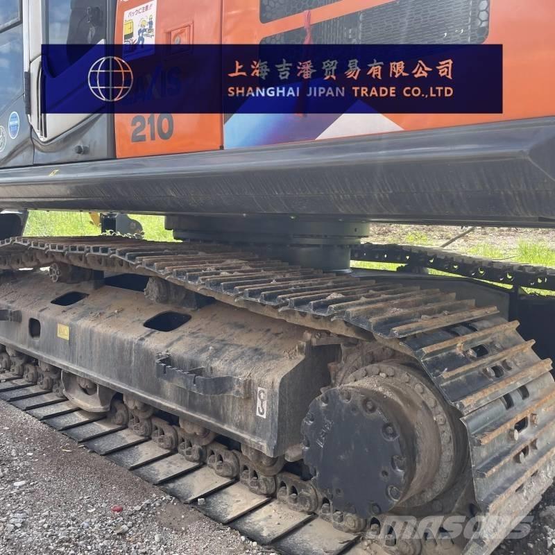 Hitachi ZX 210 Гусеничні екскаватори