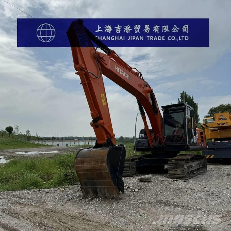 Hitachi ZX 210 Гусеничні екскаватори