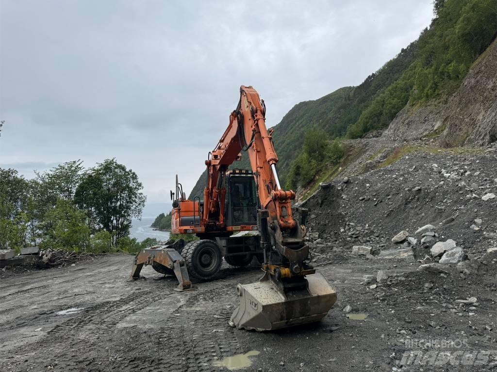 Doosan 140 W Колісні екскаватори