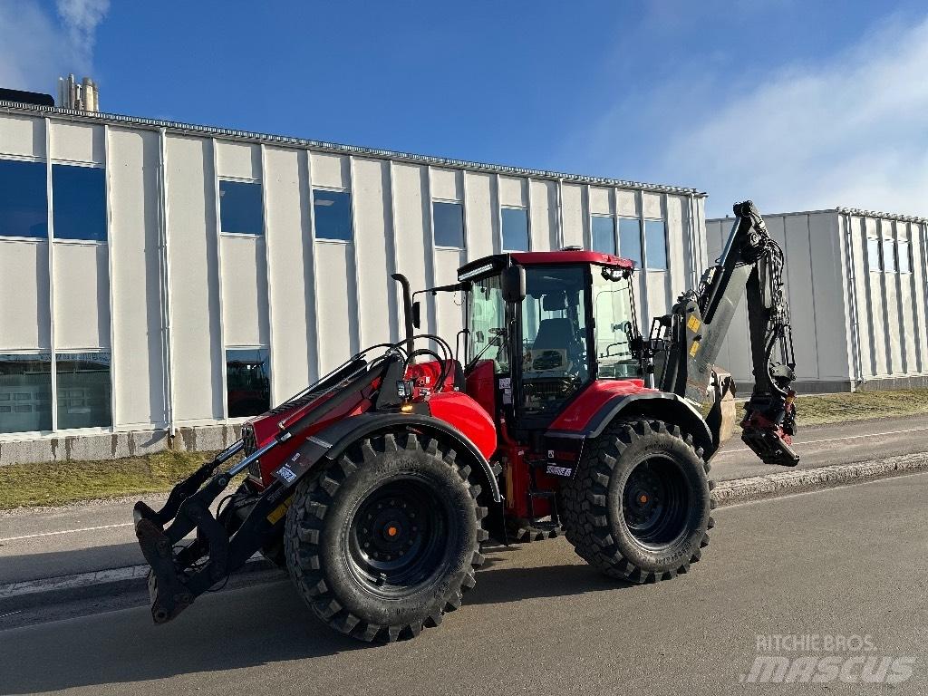 Huddig 1260 C Екскаватори-навантажувачі