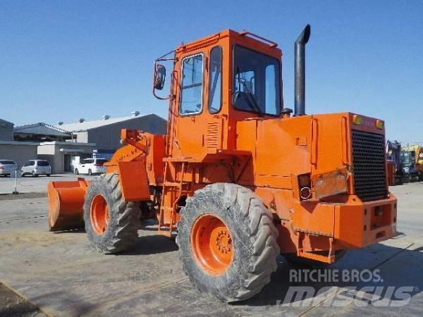 Hitachi LX70 Фронтальні навантажувачі