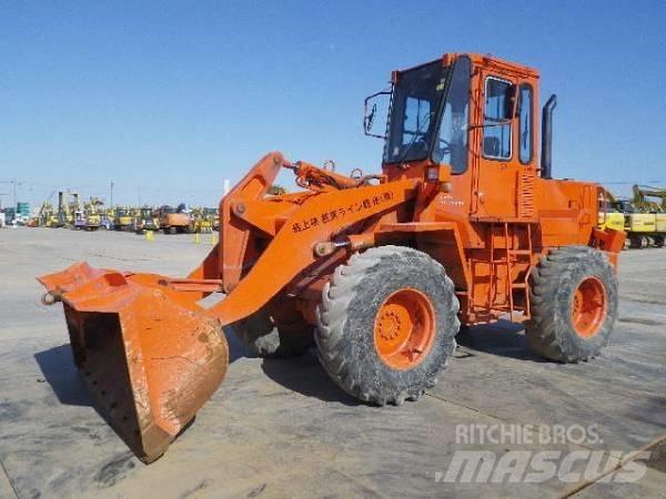 Hitachi LX70 Фронтальні навантажувачі