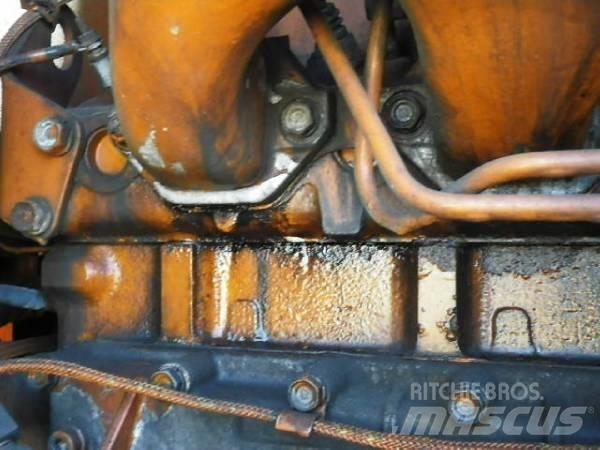 Hitachi LX70 Фронтальні навантажувачі