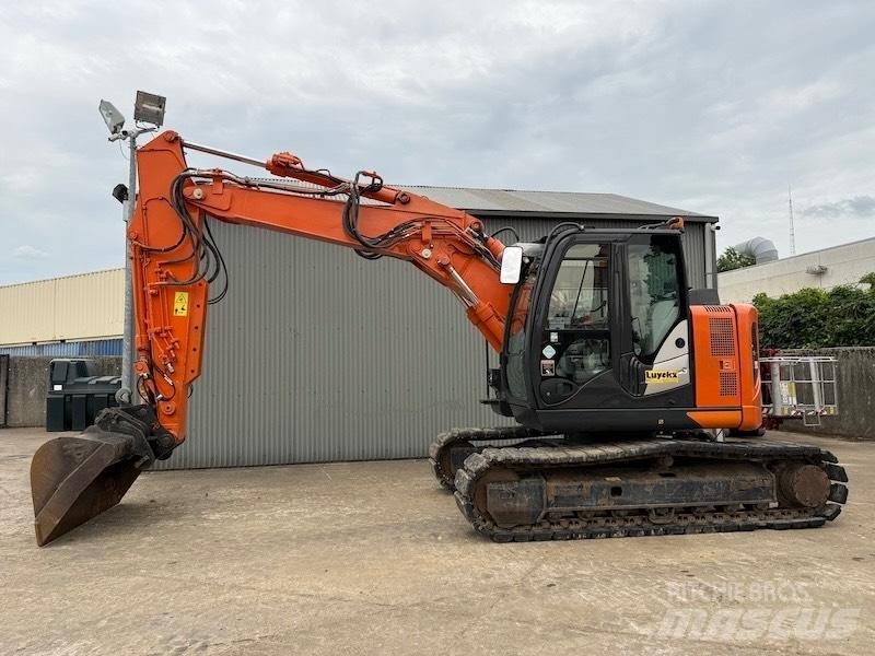 Hitachi ZX 135 US-6 Гусеничні екскаватори