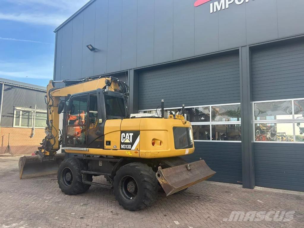 CAT M313D Колісні екскаватори