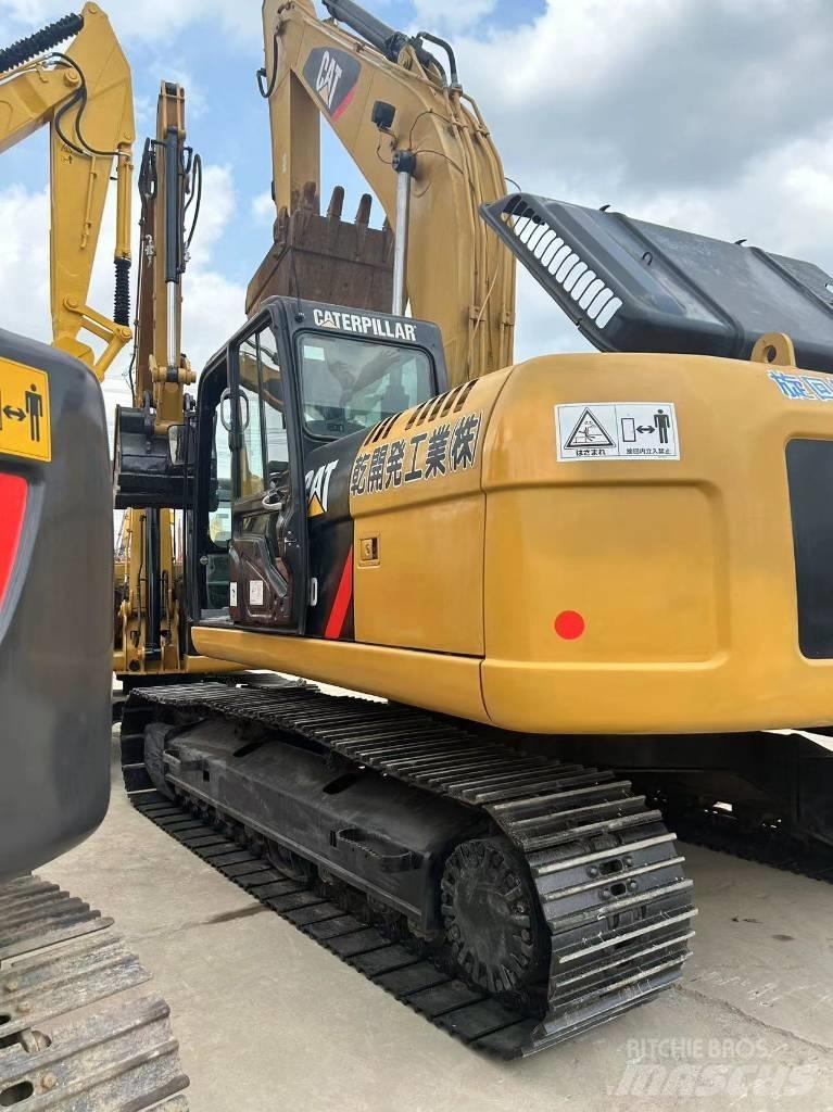 CAT CAT323D Гусеничні екскаватори