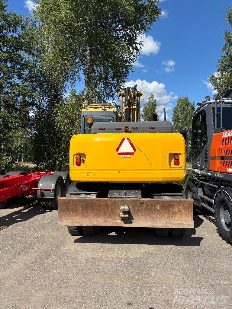 Komatsu PW 140-7 Колісні екскаватори