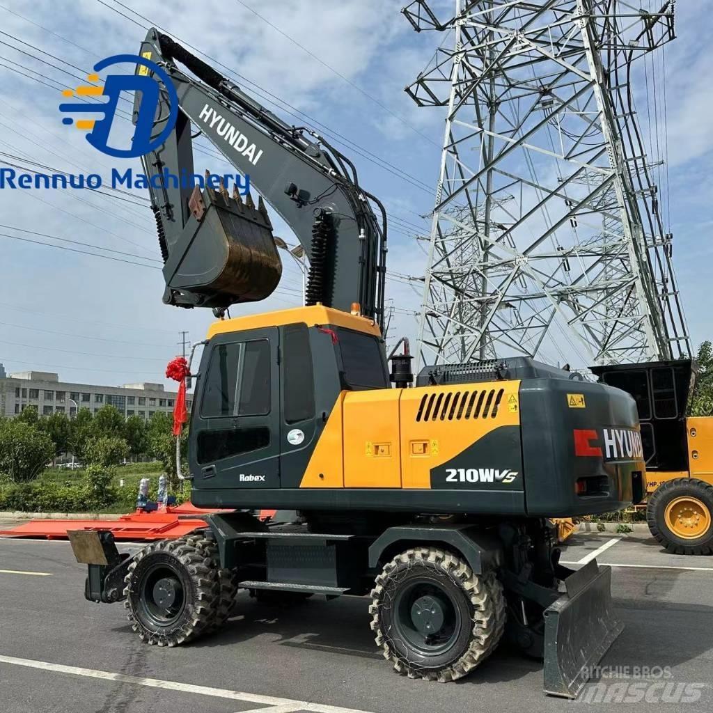 Hyundai 210W-9 Колісні екскаватори