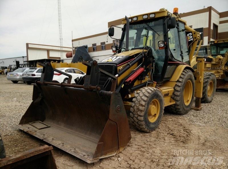 CAT 428E Екскаватори-навантажувачі