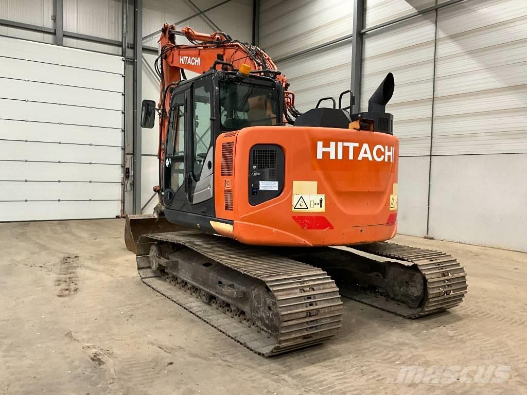 Hitachi ZX 135 US-6 Гусеничні екскаватори