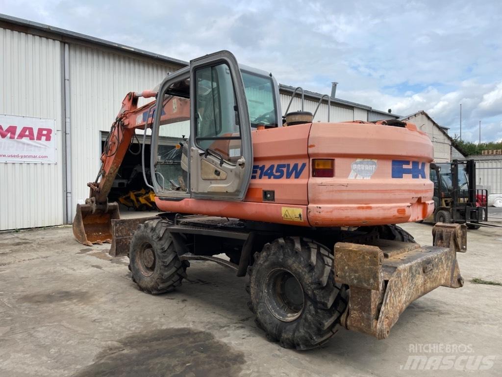 Kobelco E145W Колісні екскаватори