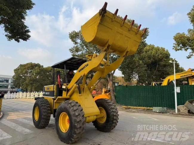 Komatsu WA 100 Фронтальні навантажувачі