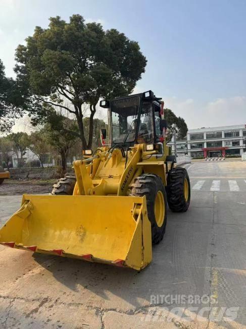 Komatsu WA 100 Фронтальні навантажувачі